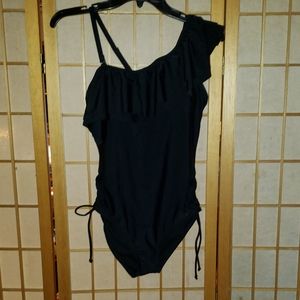 Black one piece bathing suit.